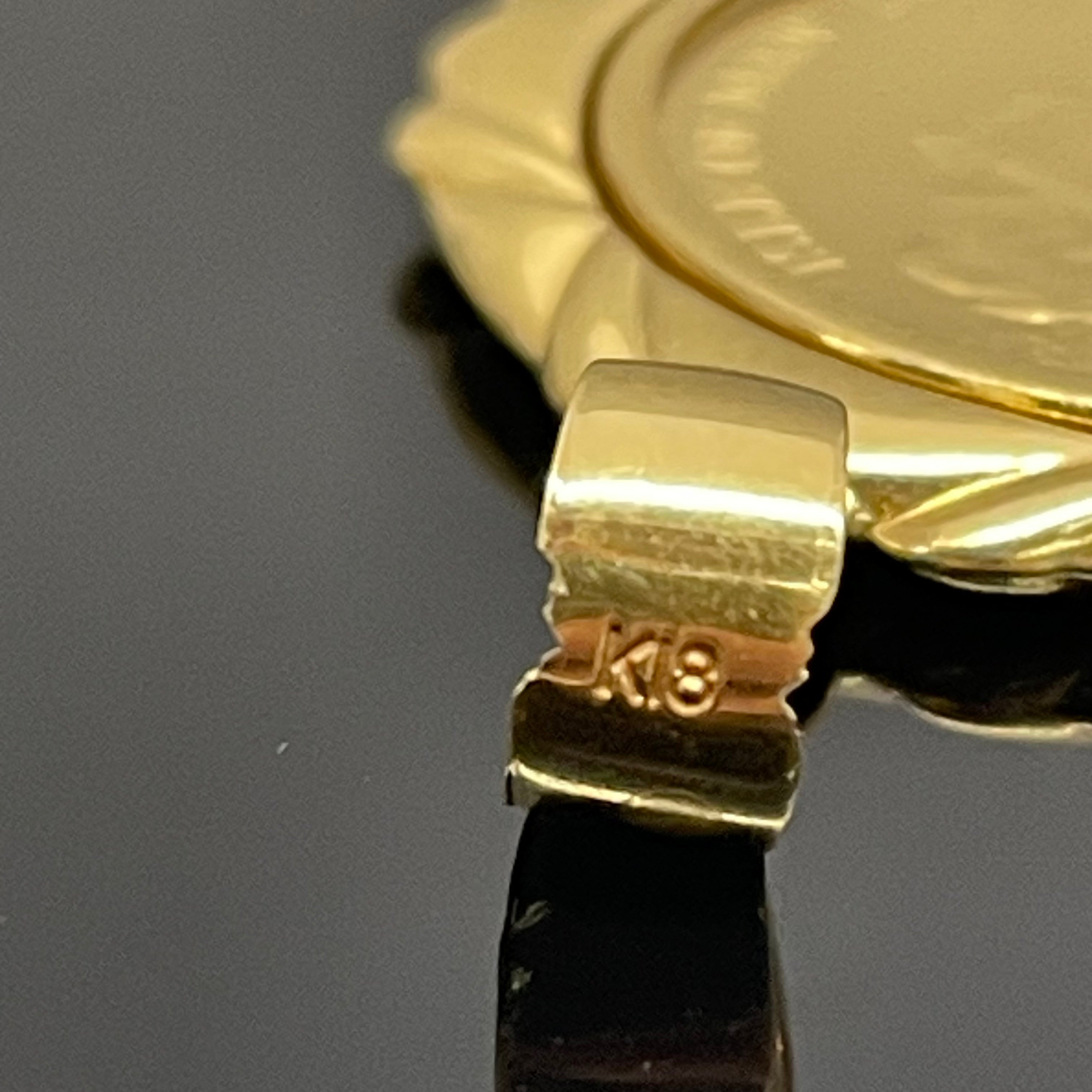 ノンブランド _マン島キャット金貨 _ペンダントトップ _純金コイン1/5oz 枠K18_ ガラス込10.6g_中古品