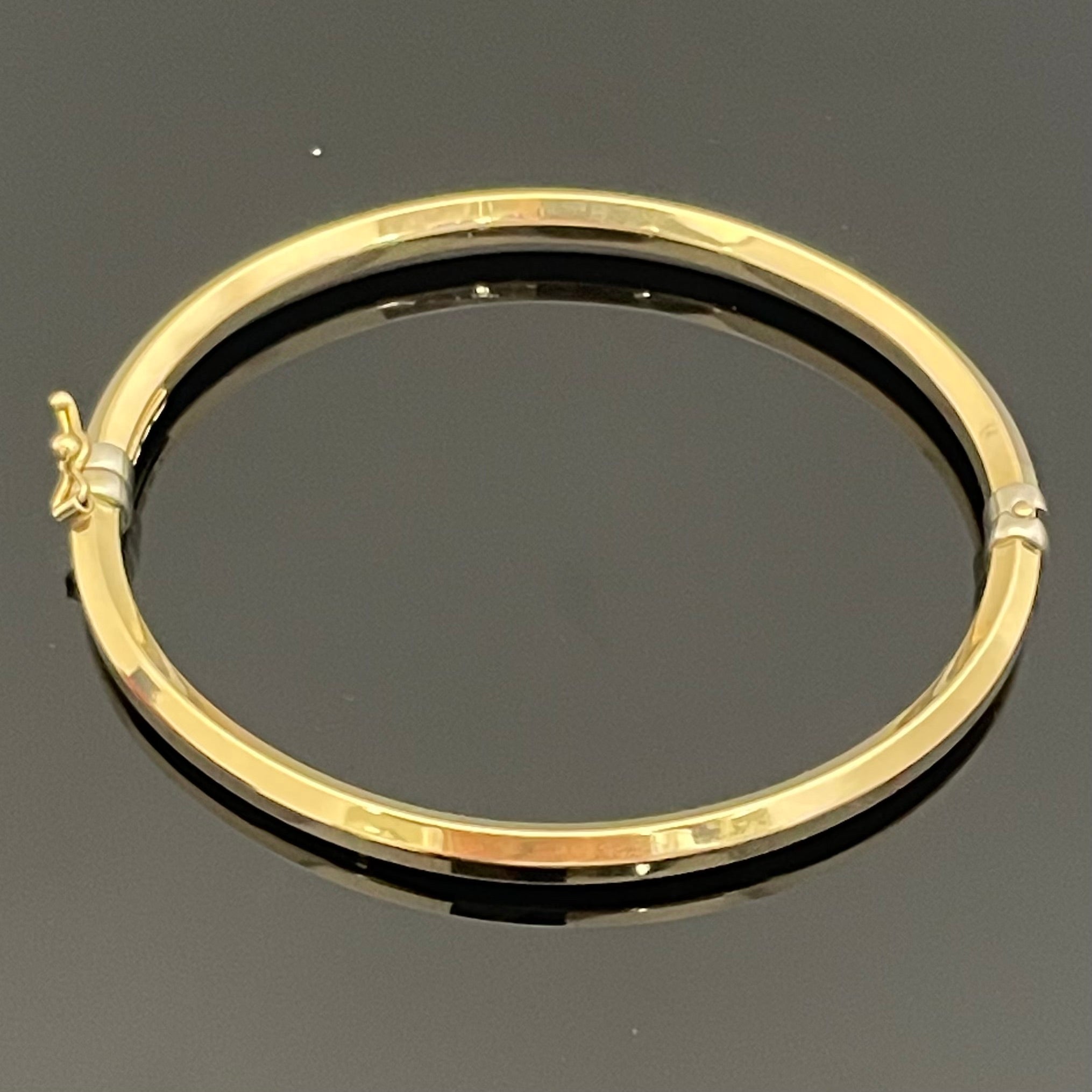 【送料無料】_ UNOAERRE_(ウノアエレ)_K18バングル_7.8g/17.5cm_ 中古品