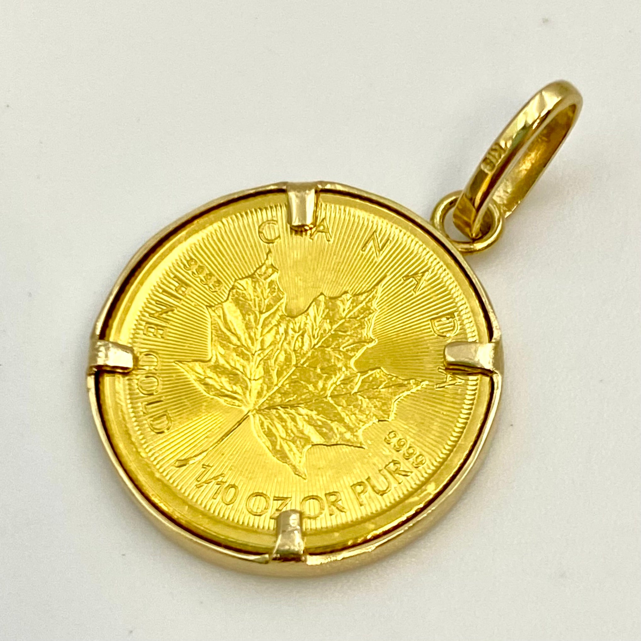 【送料無料】_ ノンブランド _メイプルリーフ金貨1/10oz_ペンダントトップ _枠K18/総重量4.1g _中古品