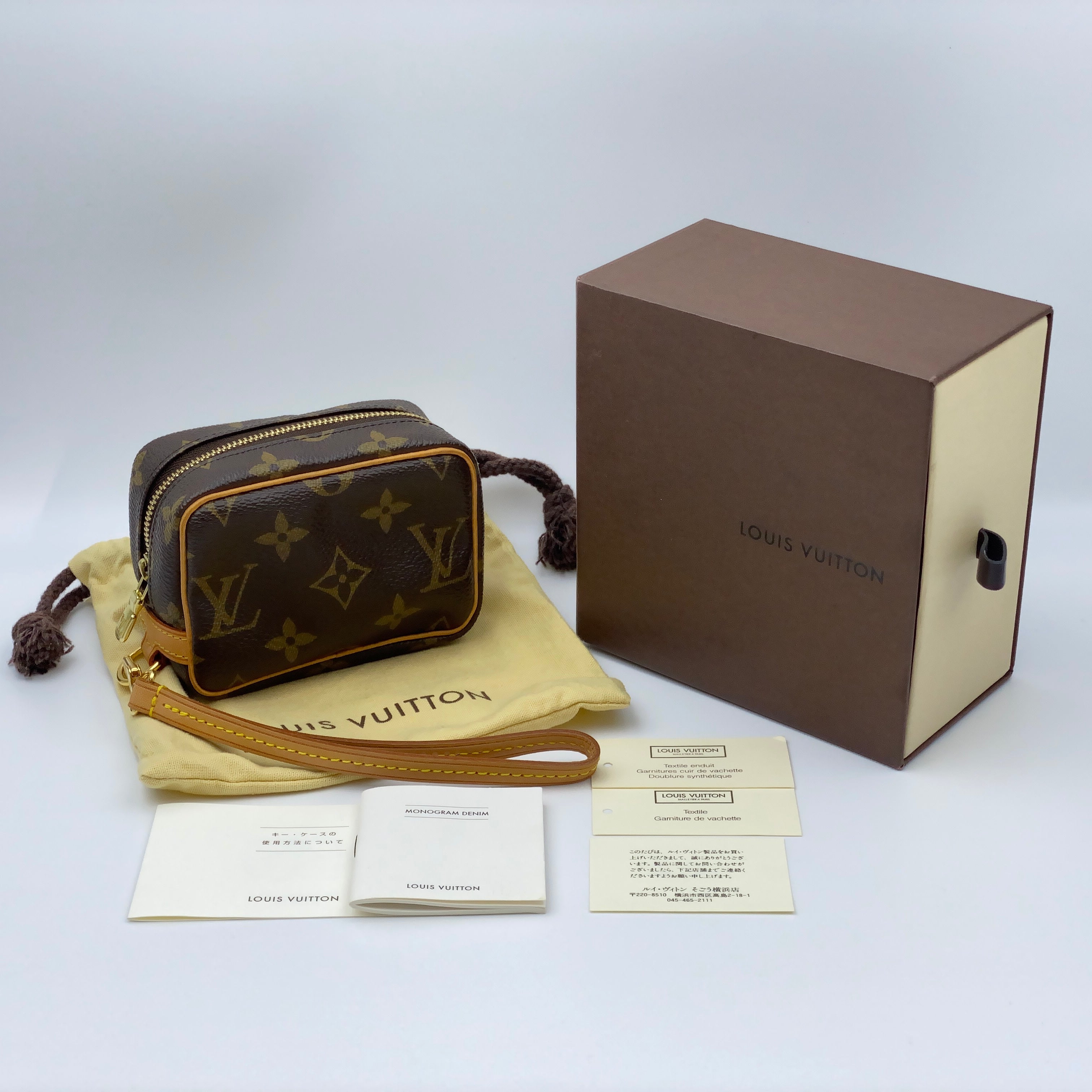LOUIS VUITTON_(ルイヴィトン)_モノグラム トゥルース ワピティ_ストラップ付きミニポーチ_M58030_中古品