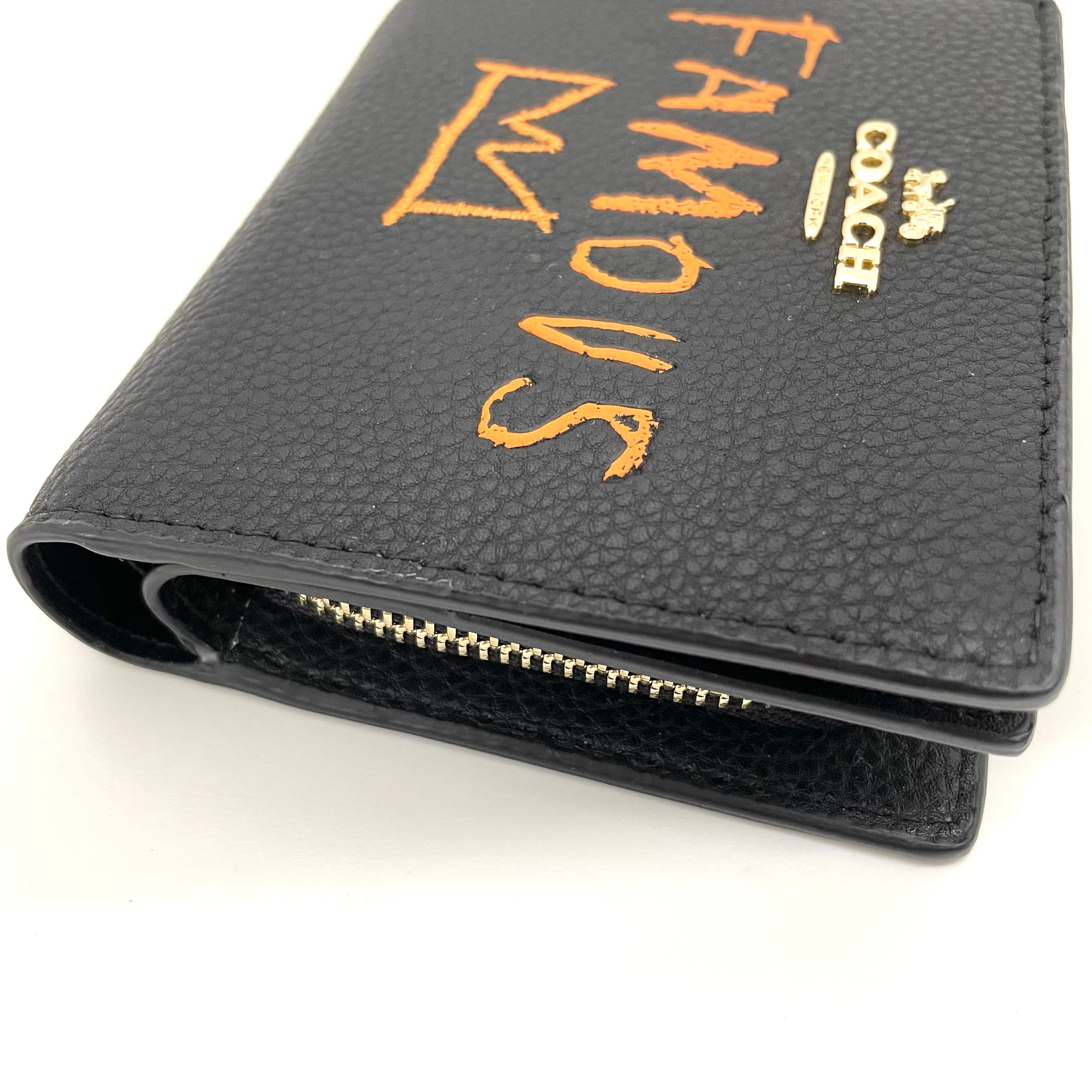 【送料無料】_ COACH_(コーチ)_ミシェル・バスキア コラボ_ 二つ折り財布 C5614 _中古品