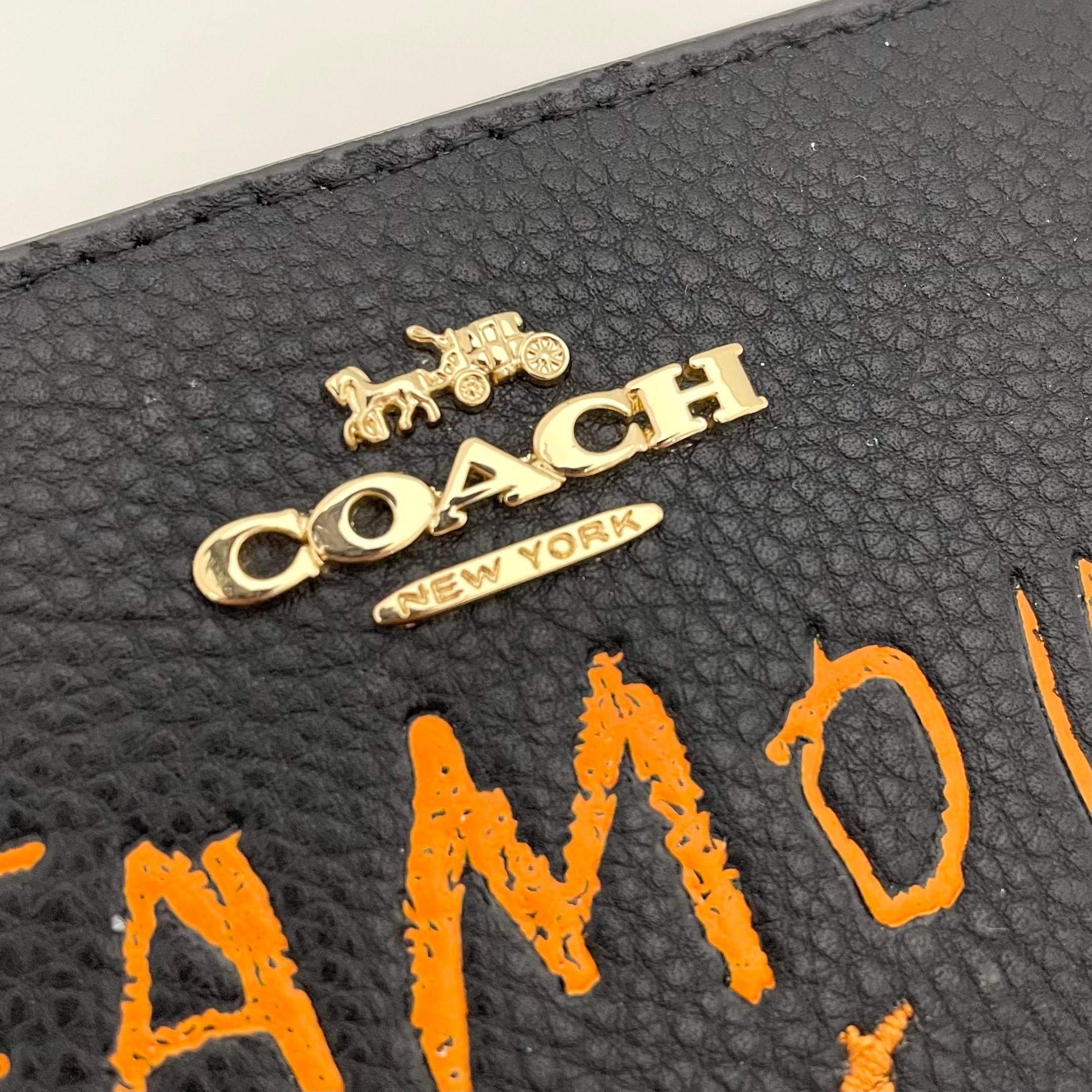 【送料無料】_ COACH_(コーチ)_ミシェル・バスキア コラボ_ 二つ折り財布 C5614 _中古品