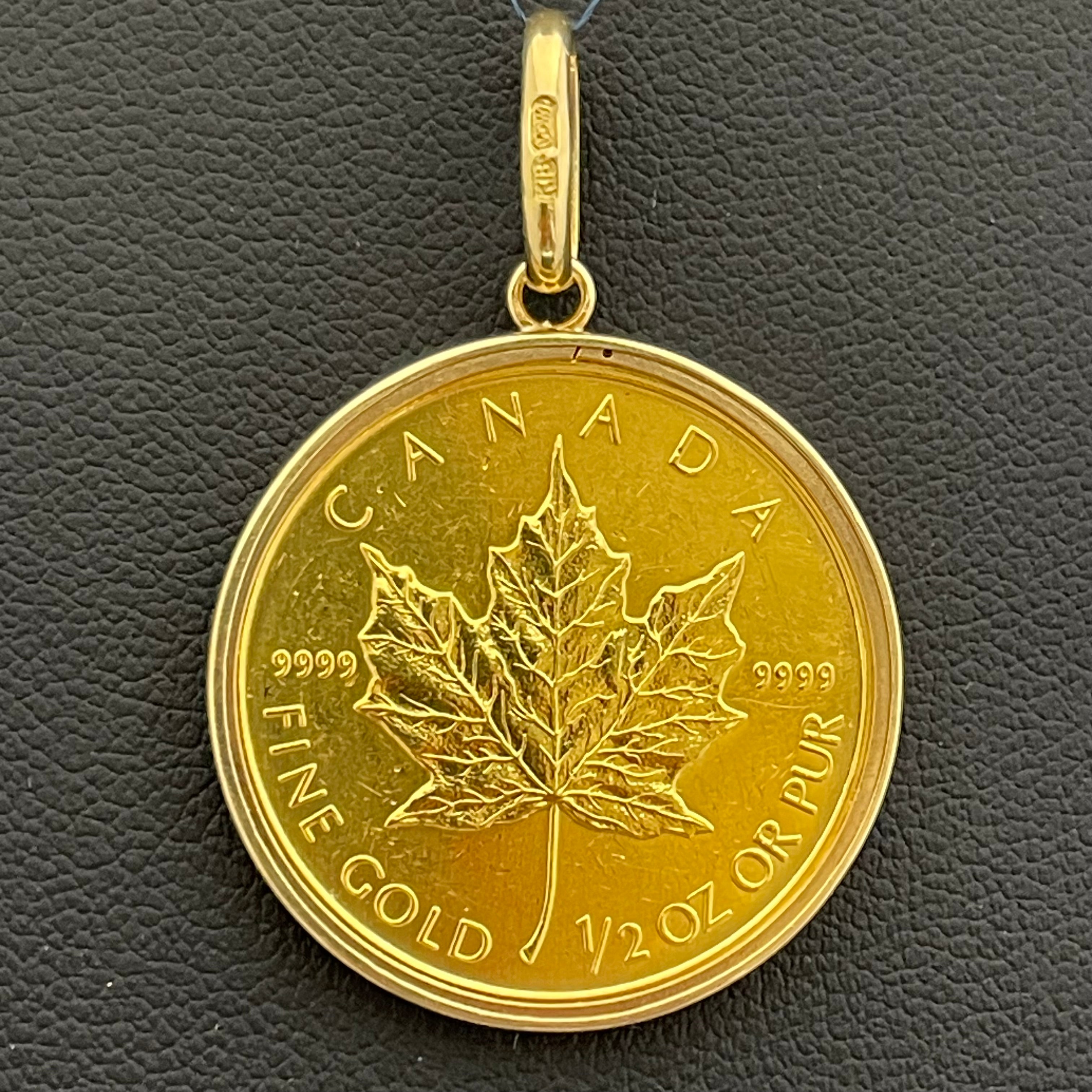 ノンブランド_ 純金コインペンダントトップ_ メイプルリーフ金貨1/2oz_ K18枠（総重量17.8g）_中古品