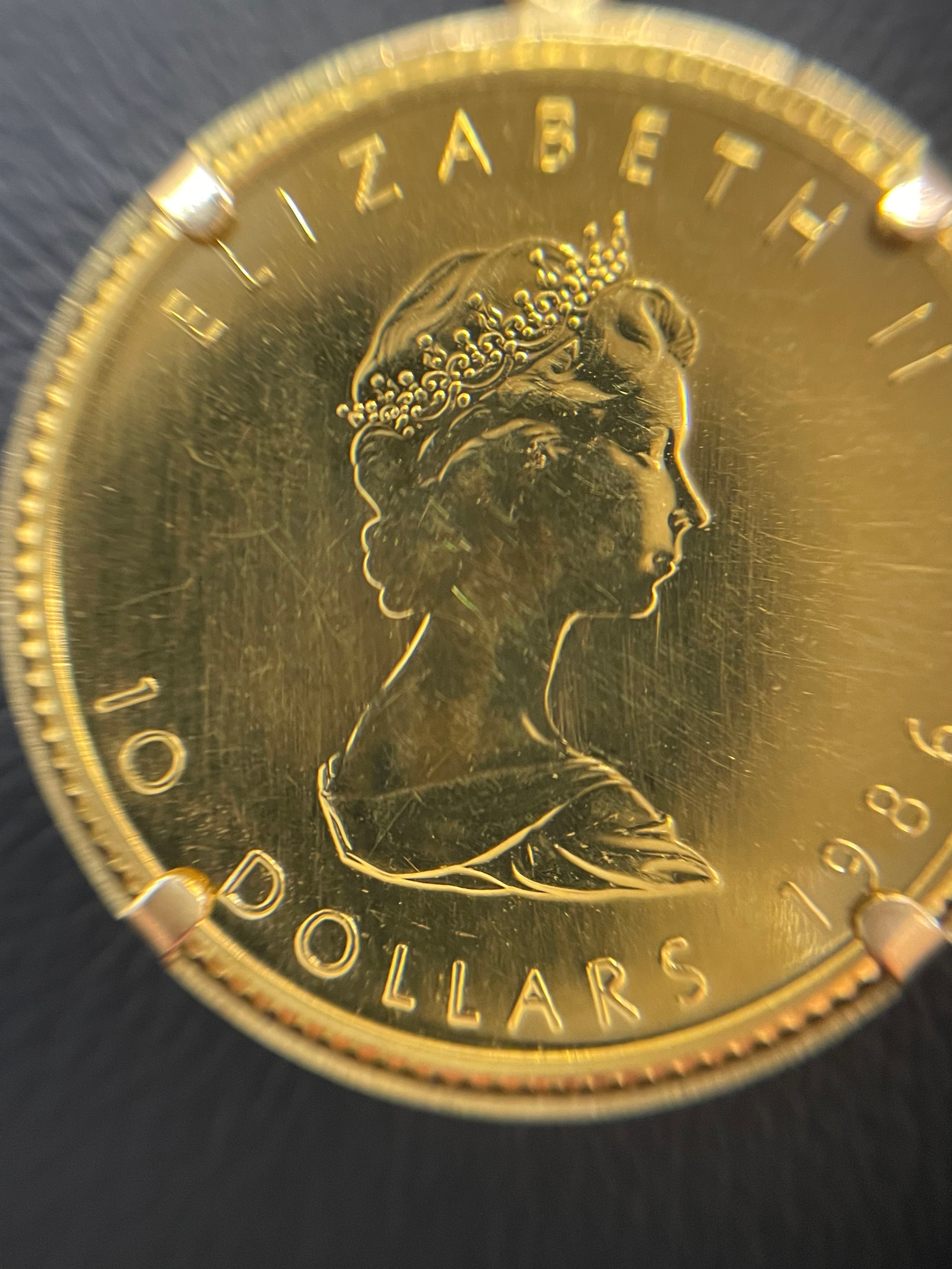 GINZA TANAKA_メイプルリーフ金貨1/4oz_ ペンダントトップ 8.8g_（純金コイン+K18）_中古品