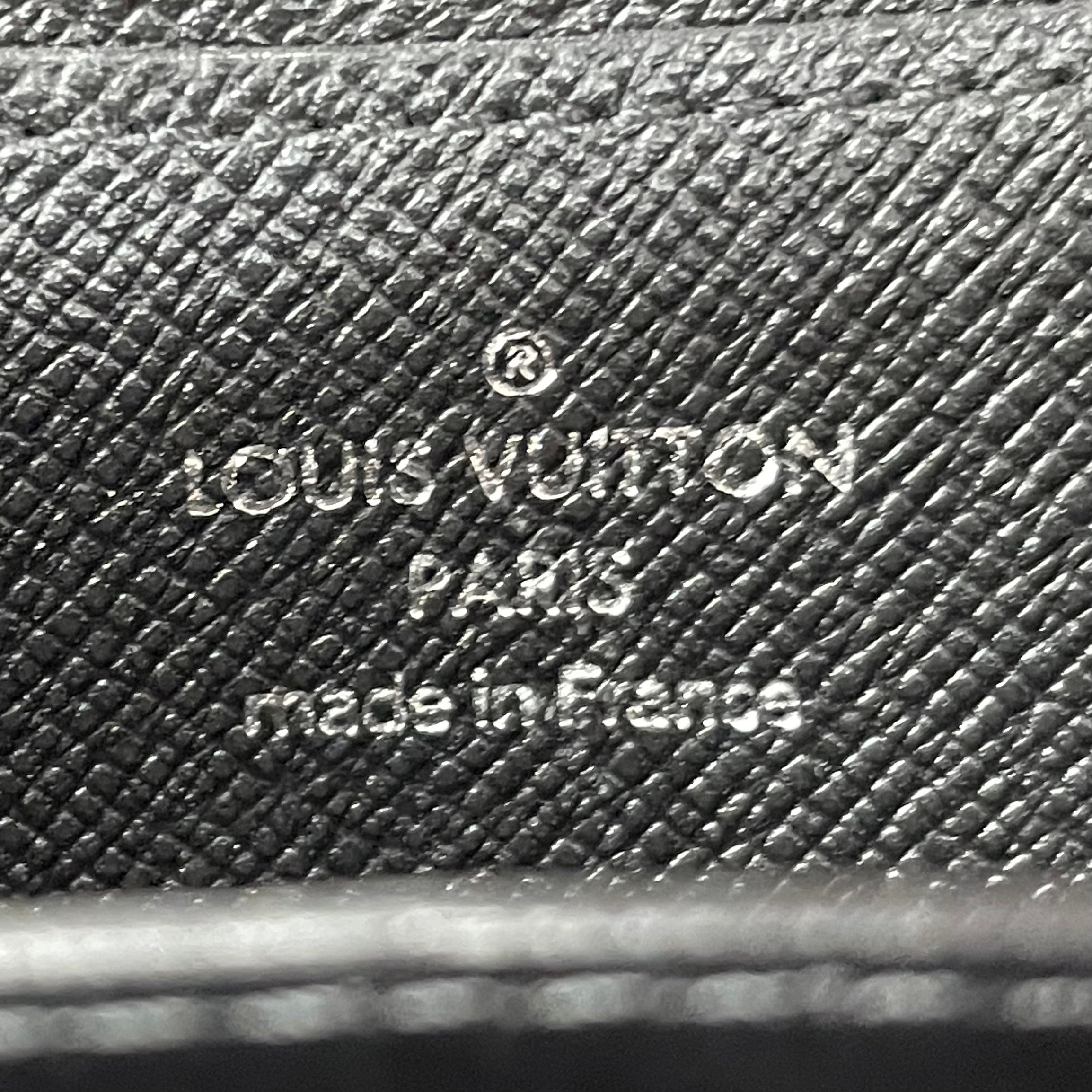 LOUIS VUITTON_（ルイヴィトン）_ダミエ グラフィット _ジッピー コインパース_ N63076 _中古品