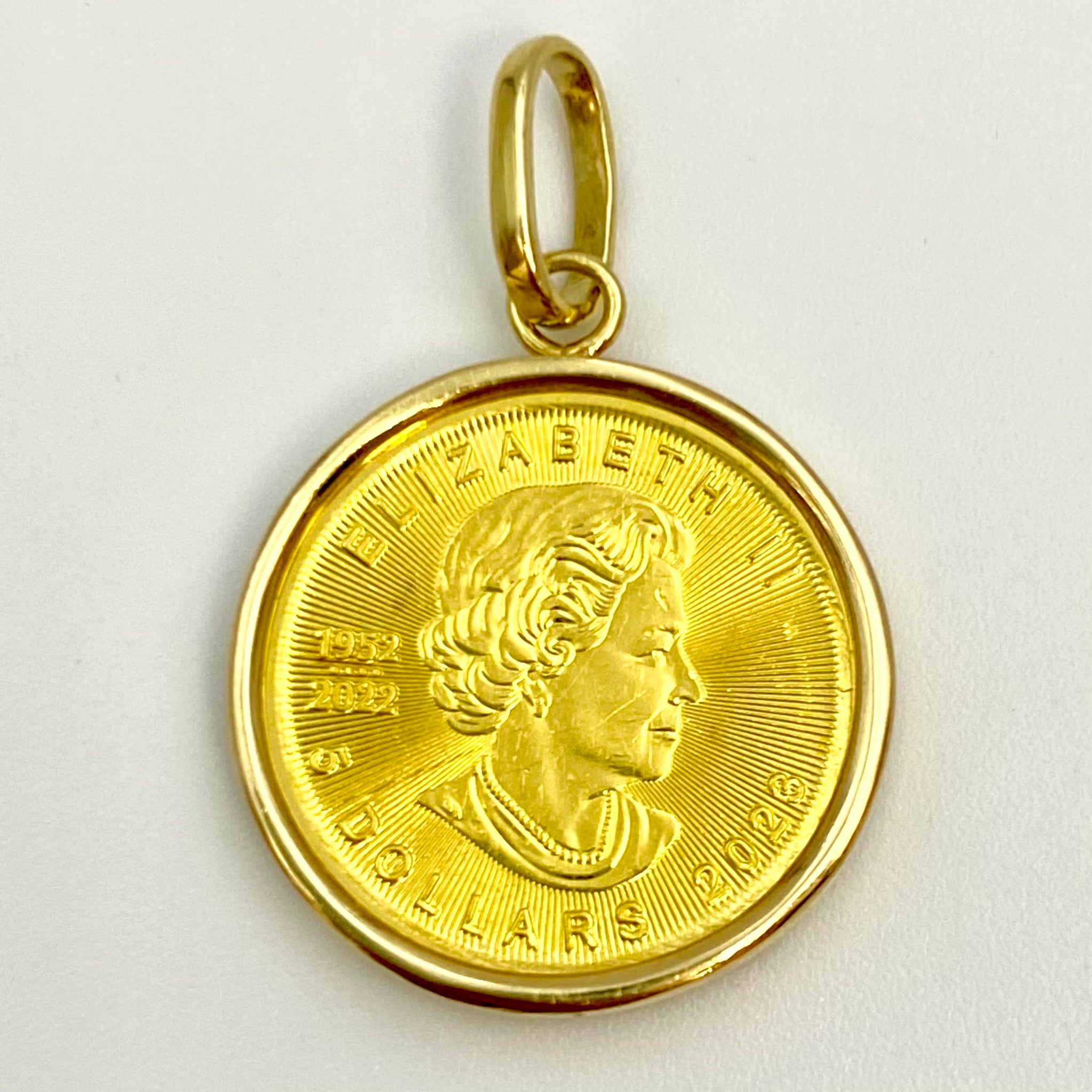 【送料無料】_ ノンブランド _メイプルリーフ金貨1/10oz_ペンダントトップ _枠K18/総重量4.1g _中古品