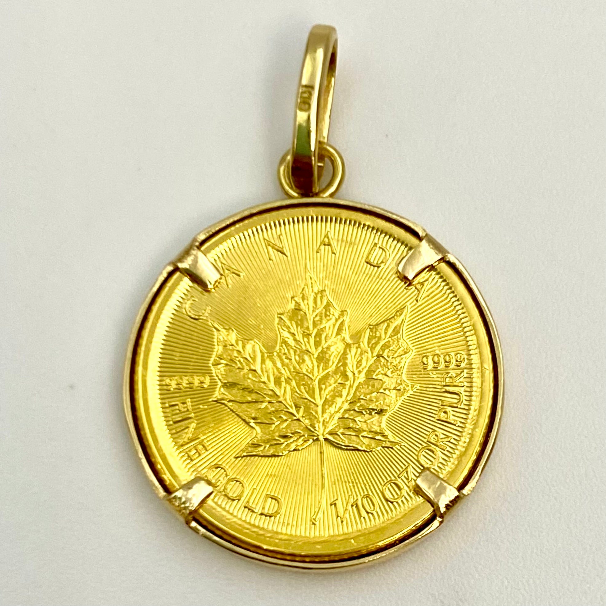 【送料無料】_ ノンブランド _メイプルリーフ金貨1/10oz_ペンダントトップ _枠K18/総重量4.1g _中古品